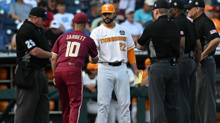 Jun 14, 2024; Omaha, NE, USA;  Florida State Seminoles head coach Link Jarrett and Florida State Seminoles head coach Link Jarrett meet before the game at Charles Schwab Filed Omaha. Mandatory Credit: Steven Branscombe-USA TODAY Sports