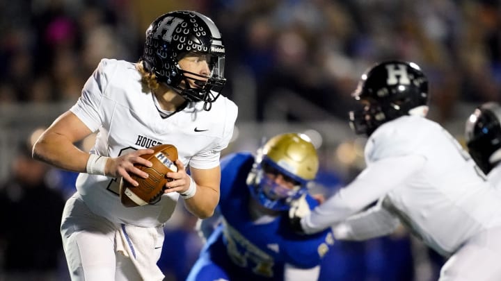 Houston's Chandler Day (15) looks for a receiver against Brentwood during the first quarter of a Class 6A semifinal game at Brentwood High School in Brentwood, Tenn., Friday, Nov. 24, 2023.