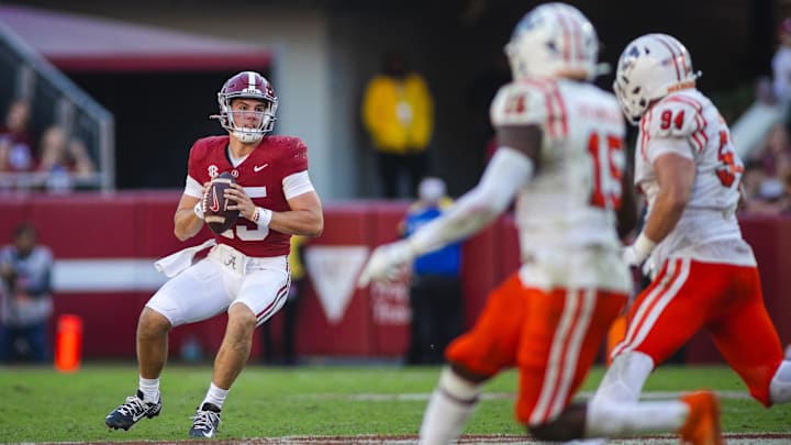 Nov 16, 2024; Tuscaloosa, Alabama, USA; Alabama Crimson Tide quarterback Ty Simpson (15) looks to make a pass against the Mercer Bears during the fourth quarter at Bryant-Denny Stadium. Nov 16, 2024; Tuscaloosa, Alabama, USA; Alabama Crimson Tide quarterback Ty Simpson (15) looks to make a pass against the Mercer Bears during the fourth quarter at Bryant-Denny Stadium.
