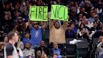 Dallas Mavericks fans with "Fire Nico" sign