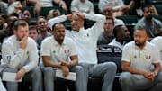 Jan 18, 2025; Coral Gables, Florida, USA; Miami Hurricanes interim head coach Bill Courtney reacts from the bench against the Southern Methodist Mustangs during the first half at Watsco Center. Mandatory Credit: Sam Navarro-Imagn Images