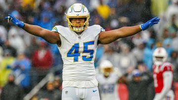 Dec 3, 2023; Foxborough, Massachusetts, USA; Los Angeles Chargers linebacker Tuli Tuipulotu (45) reacts after stoping the first down against the New England Patriots in the second quarter at Gillette Stadium. Mandatory Credit: David Butler II-USA TODAY Sports