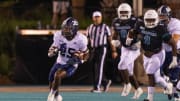 Oct 1, 2022; Conway, South Carolina, USA; Georgia Southern Eagles running back Jalen White (25) runs the ball in the second quarter against the Coastal Carolina Chanticleers at Brooks Stadium. Mandatory Credit: David Yeazell-USA TODAY Sports