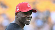 Tampa Bay Buccaneers head coach Todd Bowles warms up for a game against the Pittsburgh Steelers 
