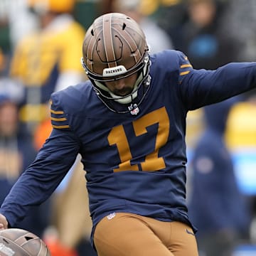 Green Bay Packers kicker Brandon McManus (17) warms up with punter Daniel Whelan (19) before a game against the Panthers.