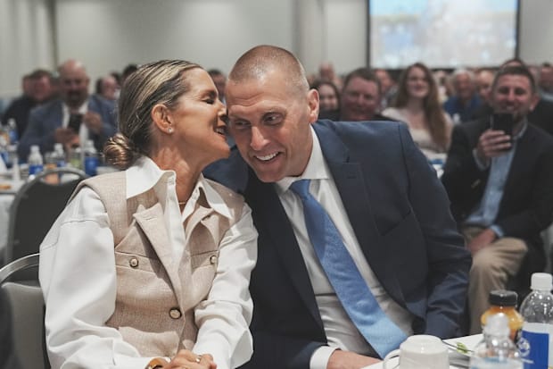 Pope and Lee Anne laugh together during a charity event in August.