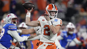 Dec 7, 2024; Charlotte, NC, USA; Clemson Tigers quarterback Cade Klubnik (2) throws during the third quarter against the Southern Methodist Mustangs in the 2024 ACC Championship game at Bank of America Stadium. Mandatory Credit: Jim Dedmon-Imagn Images