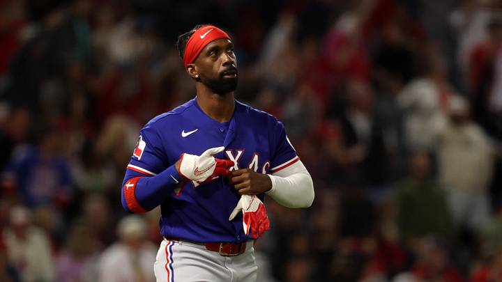 May 23, 2026; Anaheim, California, USA;  Texas Rangers pinch hitter Andrew McCutchen (4) reacts after strike out during the seventh inning against the Los Angeles Angels at Angel Stadium. Mandatory Credit: Kiyoshi Mio-Imagn Images