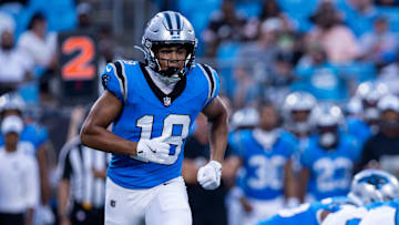 Aug 8, 2025; Charlotte, North Carolina, USA; Carolina Panthers wide receiver Jalen Coker (18) goes in motion during the second quarter against the Cleveland Browns  at Bank of America Stadium. Mandatory Credit: Scott Kinser-The USAToday Network via Imagn Images 