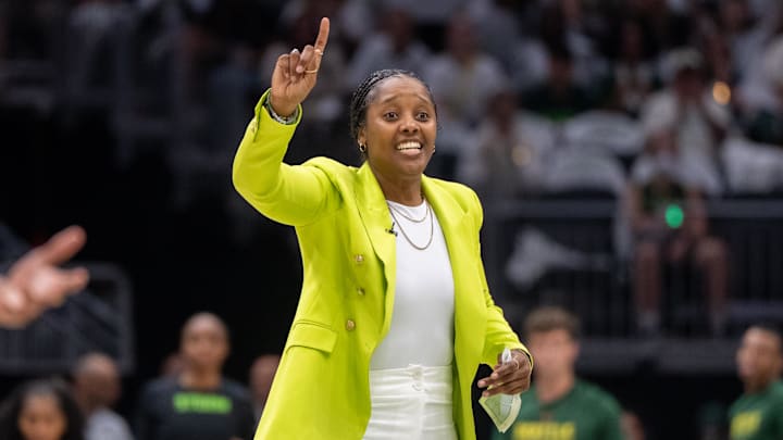 Sep 16, 2025; Seattle, Washington, USA; Seattle Storm head coach Noelle Quinn gestures to her team during the second half during game two of round one for the 2025 WNBA Playoffs against the Las Vegas Aces at Climate Pledge Arena. Mandatory Credit: Stephen Brashear-Imagn Images