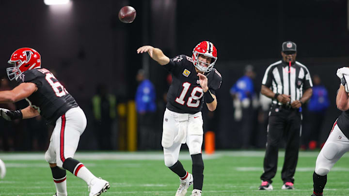 Oct 3, 2024; Atlanta, Georgia, USA; Atlanta Falcons quarterback Kirk Cousins (18) throws a pass against the Tampa Bay Buccaneers in overtime at Mercedes-Benz Stadium. Mandatory Credit: Brett Davis-Imagn Images