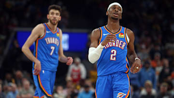 Apr 24, 2025; Memphis, Tennessee, USA; Oklahoma City Thunder guard Shai Gilgeous-Alexander (2) and forward Chet Holmgren (7) look on during the second quarter against the Memphis Grizzlies during game three for the first round of the 2024 NBA Playoffs at FedExForum. Mandatory Credit: Petre Thomas-Imagn Images
