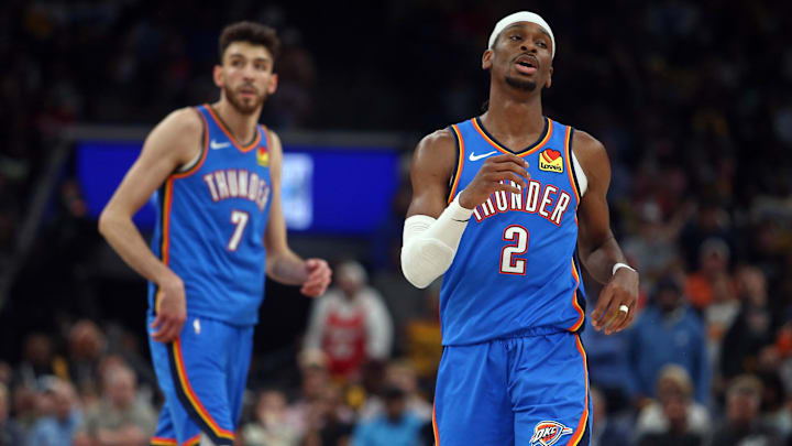Apr 24, 2025; Memphis, Tennessee, USA; Oklahoma City Thunder guard Shai Gilgeous-Alexander (2) and forward Chet Holmgren (7) look on during the second quarter against the Memphis Grizzlies during game three for the first round of the 2024 NBA Playoffs at FedExForum. Mandatory Credit: Petre Thomas-Imagn Images