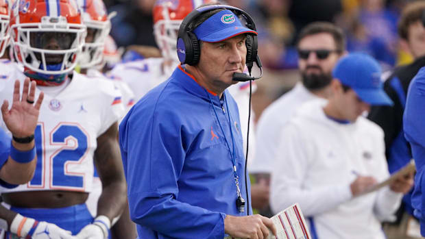 Florida Gators head coach Dan Mullen watches play against Missouri.