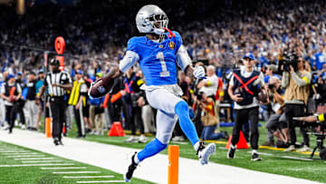 Detroit Lions wide receiver Jameson Williams (1) runs for a touchdown against Green Bay Packers during the first half at Ford Field in Detroit on Thursday, Nov. 27, 2025.