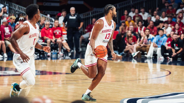 Juwan Morgan brings the ball up the court alongside Yogi Ferrell during Assembly Ball's 89-79 win over The Cru in The Basketball Tournament at Hinkle Fieldhouse.