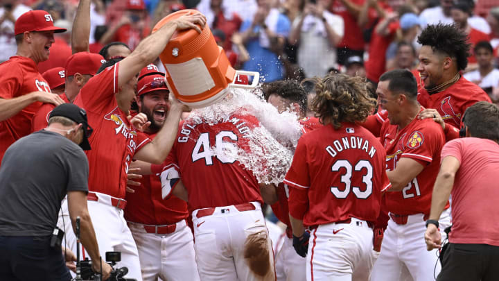 Jul 28, 2024; St. Louis, Missouri, USA; St. Louis Cardinals first baseman Paul Goldschmidt (46) is congratulated by teammates after hitting a walk-off home run against the Washington Nationals during the ninth inning at Busch Stadium. Mandatory Credit: Jeff Le-USA TODAY Sports