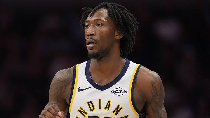 Apr 3, 2026; Charlotte, North Carolina, USA; Indiana Pacers guard Quenton Jackson (29) brings the ball up court against the Charlotte Hornets during the first quarter at Spectrum Center. Mandatory Credit: Jim Dedmon-Imagn Images
