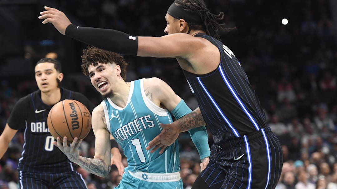 Mar 25, 2025; Charlotte, North Carolina, USA;  Charlotte Hornets guard LaMelo Ball (1) drives in during the second half against the Orlando Magic at the Spectrum Center. Mandatory Credit: Sam Sharpe-Imagn Images
