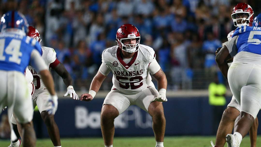 Sep 13, 2025; Oxford, Mississippi, USA; Arkansas Razorback offensive lineman Caden Kitler (52) blocks during the fourth quarter against the Mississippi Rebels at Vaught-Hemingway Stadium. Mandatory Credit: Petre Thomas-Imagn Images