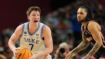 Apr 5, 2025; San Antonio, TX, USA; Duke Blue Devils guard Kon Knueppel (7) controls the ball against the Houston Cougars during the first half in the semifinals of the men's Final Four of the 2025 NCAA Tournament at the Alamodome. Mandatory Credit: Bob Donnan-Imagn Images