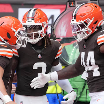 Oct 5, 2025; Tottenham, United Kingdom; Cleveland Browns tight end Harold Fannin Jr. (44) celebrates with quarterback Dillon Gabriel (left) after scoring a touchdown against the Minnesota Vikings during the first quarter of an NFL International Series game at Tottenham Hotspur Stadium. Mandatory Credit: Kirby Lee-Imagn Images