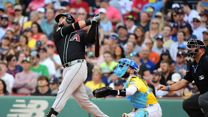 Arizona Diamondbacks third baseman Eugenio Suarez (28) hits an RBI double during the fourth inning against the Boston Red Sox at Fenway Park on Aug 24.