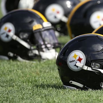 May 24, 2022; Pittsburgh, PA, USA;  Pittsburgh Steelers helmets are seen as the team participates in organized team activities at UPMC Rooney Sports Complex. Mandatory Credit: Charles LeClaire-Imagn Images