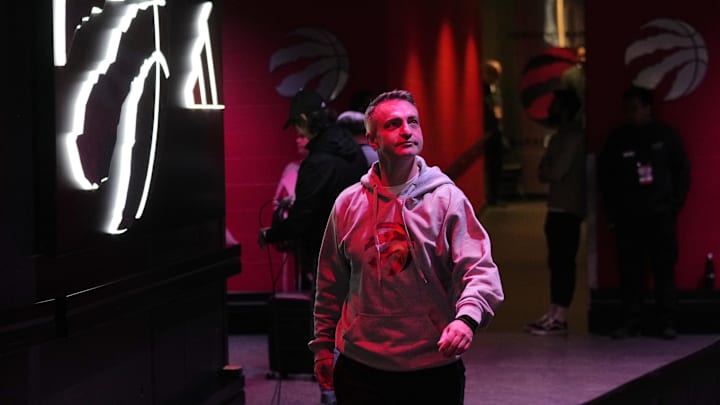 Jan 15, 2025; Toronto, Ontario, CAN; Toronto Raptors head coach Darko Rajakovic walks out to the court for warm ups before a game against the Boston Celtics at Scotiabank Arena. Mandatory Credit: John E. Sokolowski-Imagn Images