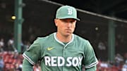 May 16, 2025; Boston, Massachusetts, USA; Boston Red Sox third baseman Alex Bregman (2) runs out of the dugout before the start of a game against the Atlanta Braves at Fenway Park. Mandatory Credit: Eric Canha-Imagn Images