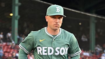 May 16, 2025; Boston, Massachusetts, USA; Boston Red Sox third baseman Alex Bregman (2) runs out of the dugout before the start of a game against the Atlanta Braves at Fenway Park. Mandatory Credit: Eric Canha-Imagn Images
