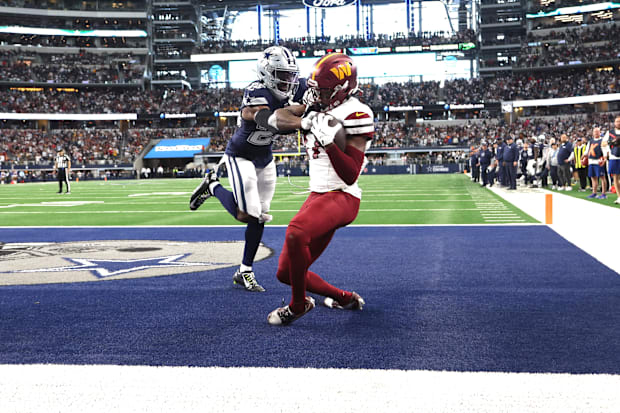Washington Commanders WR Terry McLaurin catches the game winning touchdown against Dallas Cowboys CB DaRon Bland.