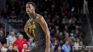 Feb 25, 2025; Cincinnati, Ohio, USA;  Baylor Bears guard VJ Edgecombe (7) reacts to making a three-point shot against the Cincinnati Bearcats in the second half at Fifth Third Arena. Mandatory Credit: Aaron Doster-Imagn Images