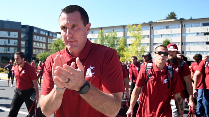 Sep 9, 2023; Pullman, Washington, USA; Washington State Cougars head coach Jake Dickert walks to Gesa Field at Martin Stadium before a game against the Wisconsin Badgers. Mandatory Credit: James Snook-USA TODAY Sports