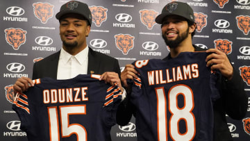 Apr 26, 2024; Lake Forest, IL, USA; Chicago Bears first round draft choices Rome Odunze (left) and Caleb Williams (right) pose for photos at a press conference at Halas Hall. Mandatory Credit: David Banks-USA TODAY Sports