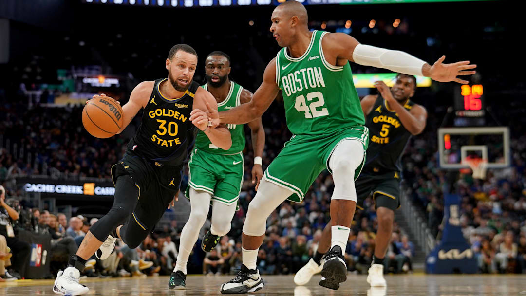Jan 20, 2025; San Francisco, California, USA; Golden State Warriors guard Stephen Curry (30) dribbles the ball next to Boston Celtics center Al Horford (42) in the third quarter at the Chase Center. Mandatory Credit: Cary Edmondson-Imagn Images
