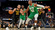 Jan 20, 2025; San Francisco, California, USA; Golden State Warriors guard Stephen Curry (30) dribbles the ball next to Boston Celtics center Al Horford (42) in the third quarter at the Chase Center. Mandatory Credit: Cary Edmondson-Imagn Images