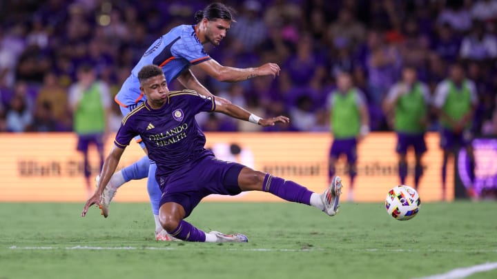 Jul 20, 2024; Orlando, Florida, USA; Orlando City defender Rafael Santos (3) battle for the ball against New York City FC in the second half at Inter&Co Stadium. Mandatory Credit: Nathan Ray Seebeck-USA TODAY Sports