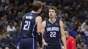 Orlando Magic center Moritz Wagner (21) speaks to forward Franz Wagner (22) during a break in play against the Washington Wizards in the second quarter at Amway Center. 