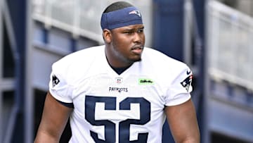 Jun 9, 2025; Foxborough, MA, USA; New England Patriots offensive tackle Marcus Bryant (52) walks to the practice fields at Gillette Stadium. Mandatory Credit: Eric Canha-Imagn Images