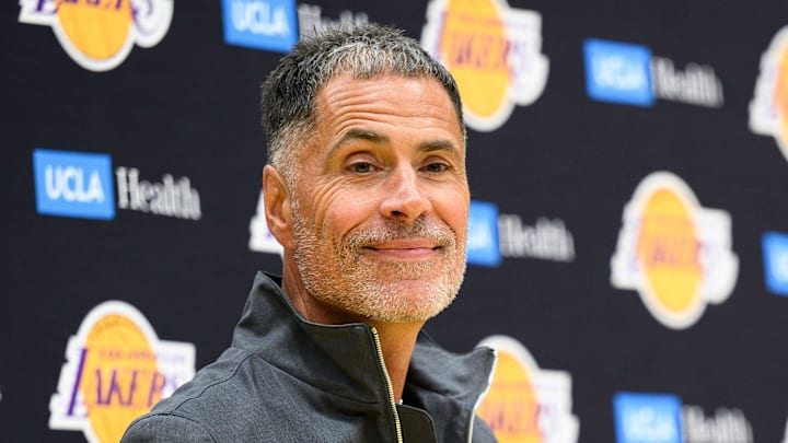 Sep 25, 2025; El Segundo, CA, USA; Los Angeles Lakers general manager Rob Pelinka, left, speaks during a press conference to preview the 2025-26 season at UCLA Health Training Center. Mandatory Credit: William Liang-Imagn Images