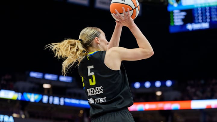 Sep 1, 2025; Minneapolis, Minnesota, USA; Dallas Wings guard Paige Bueckers (5) shoots over Minnesota Lynx guard Courtney Williams (10) in the third quarter at Target Center. Mandatory Credit: Matt Blewett-Imagn Images Sep 1, 2025; Minneapolis, Minnesota, USA; Dallas Wings guard Paige Bueckers (5) shoots over Minnesota Lynx guard Courtney Williams (10) in the third quarter at Target Center. Mandatory Credit: Matt Blewett-Imagn Images