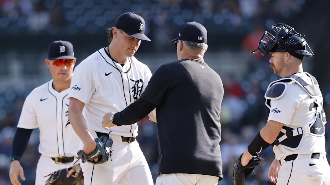 Jun 19, 2025; Detroit, Michigan, USA;  Detroit Tigers manager A.J. Hinch (mg) take the ball to relieve pitcher Tyler Holton (87) in the second inning against the Pittsburgh Pirates at Comerica Park. Mandatory Credit: Rick Osentoski-Imagn Images