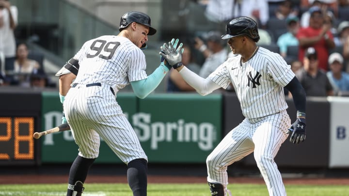 Aug 25, 2024; Bronx, New York, USA;  New York Yankees right fielder Juan Soto (22) celebrates with New York Yankees center fielder Aaron Judge (99) after hitting a solo home run in the seventh inning against the Colorado Rockies at Yankee Stadium. Mandatory Credit: Wendell Cruz-USA TODAY Sports