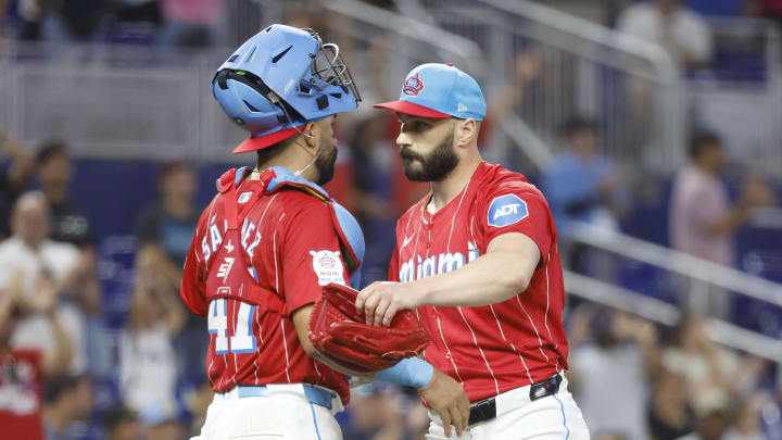 Jul 6, 2024; Miami, Florida, USA; Miami Marlins relief pitcher Tanner Scott (66) and catcher Ali Sanchez (47) celebrate their win against the Chicago White Sox at loanDepot Park. Mandatory Credit: Rhona Wise-USA TODAY Sports