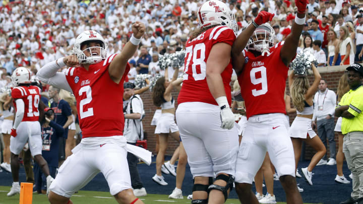 Sep 2, 2023; Oxford, Mississippi, USA; Mississippi Rebels quarterback Jaxson Dart (2) and wide receiver Tre Harris (9) react after a touchdown during the first half against the Mercer Bears at Vaught-Hemingway Stadium. Mandatory Credit: Petre Thomas-USA TODAY Sports