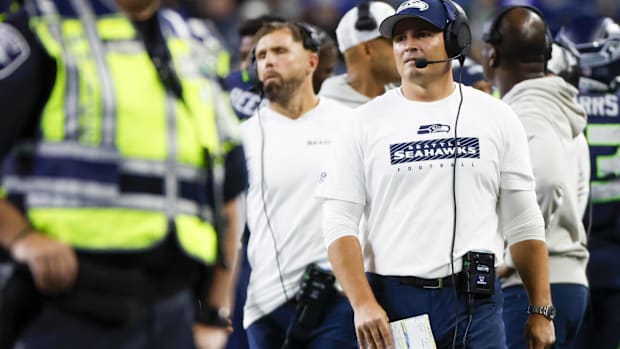 Seattle Seahawks head coach Mike Macdonald stands on the sideline during the fourth quarter against the Cleveland Browns.