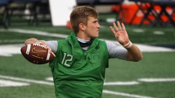 Dec 5, 2020; Berkeley, California, USA; Oregon Ducks quarterback Tyler Shough (12) warms up before the game against the California Golden Bears at California Memorial Stadium.