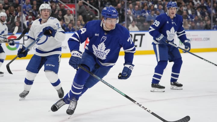 Apr 3, 2024; Toronto, Ontario, CAN; Toronto Maple Leafs forward Bobby McMann (74) skates against the Tampa Bay Lightning during the third period at Scotiabank Arena. Mandatory Credit: John E. Sokolowski-USA TODAY Sports