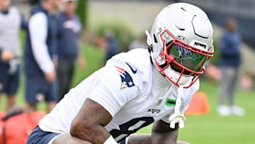 Jun 9, 2025; Foxborough, MA, USA; New England Patriots wide receiver Stefon Diggs (8) stretches during minicamp at Gillette Stadium. Mandatory Credit: Eric Canha-Imagn Images